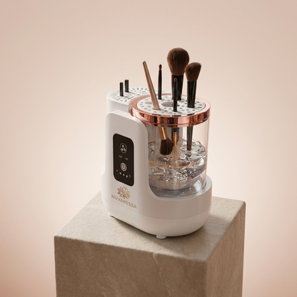 Nuvaressa Rechargeable Brush Cleaner on a stone pedestal